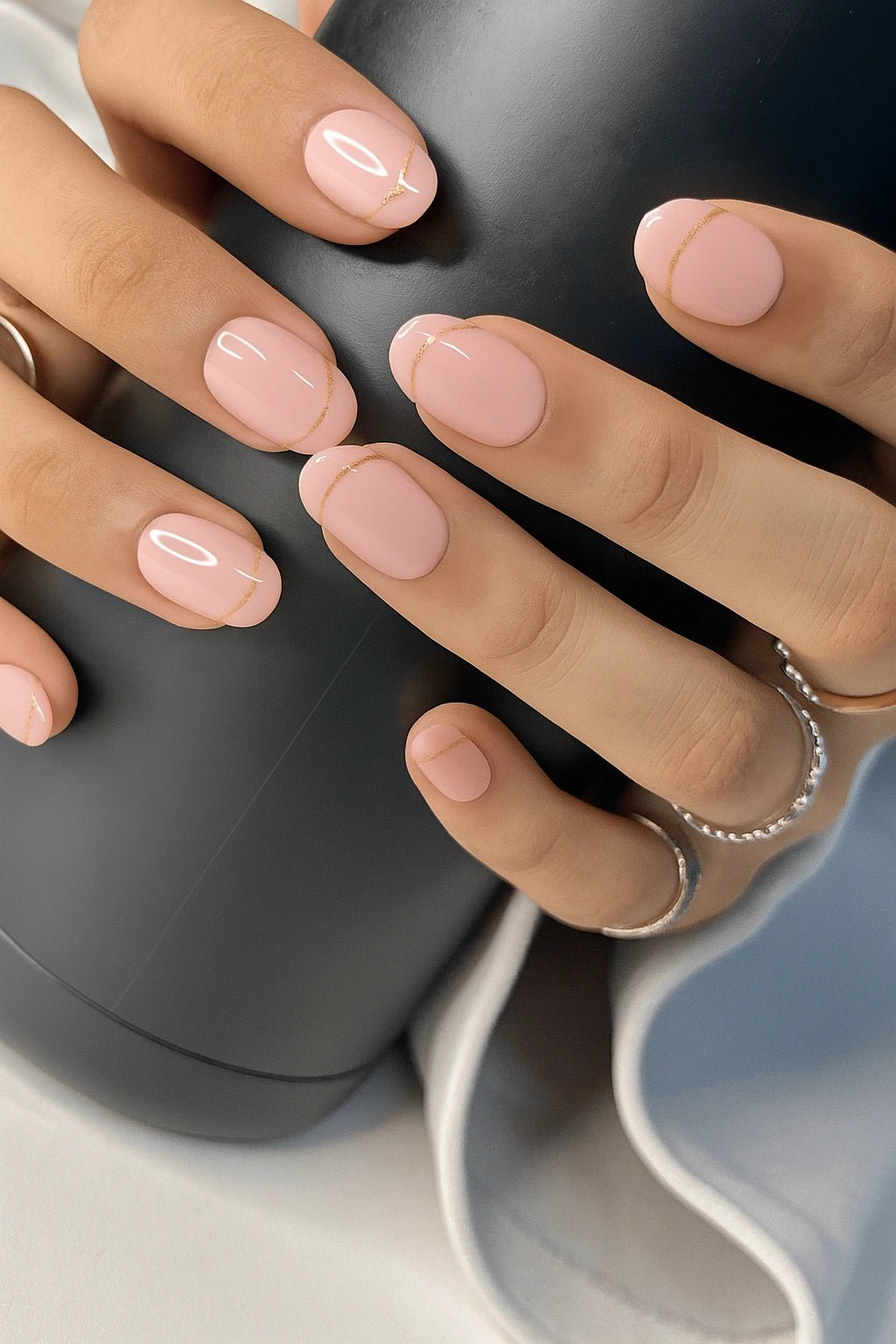 Buy short round Nude pink glitter french fake press on nails online