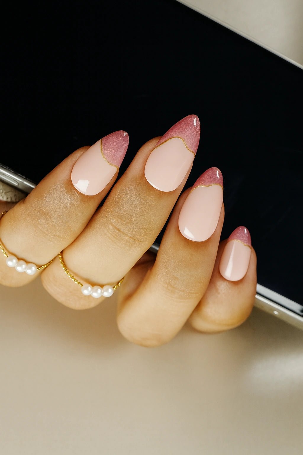 These nails carry a double french on its top the first one pink cat eye french tip and second one is golden chrome french tip nails. This cat eye set has different design on each finger and also on the thumb.