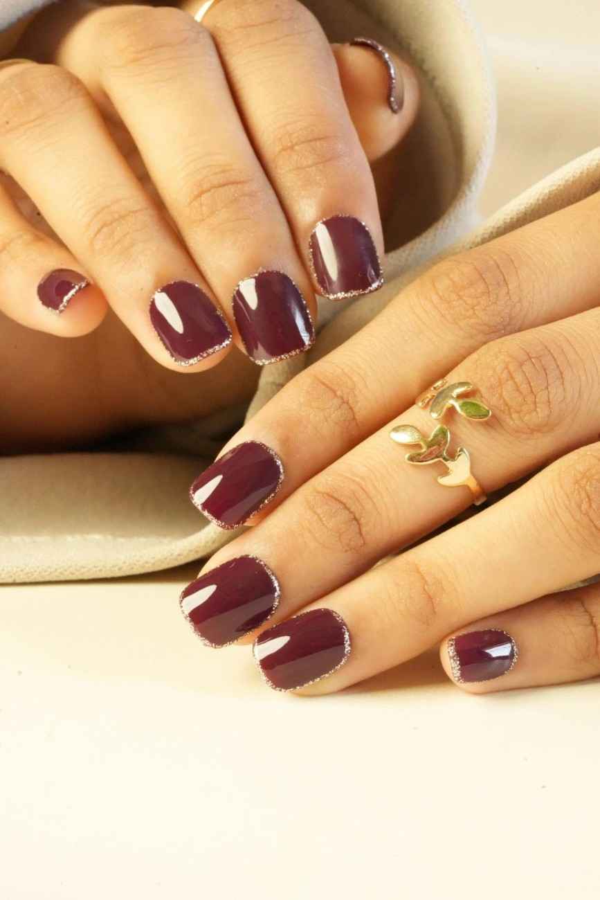 Elegant berry-toned press-on nails for special occasions and everyday glamour