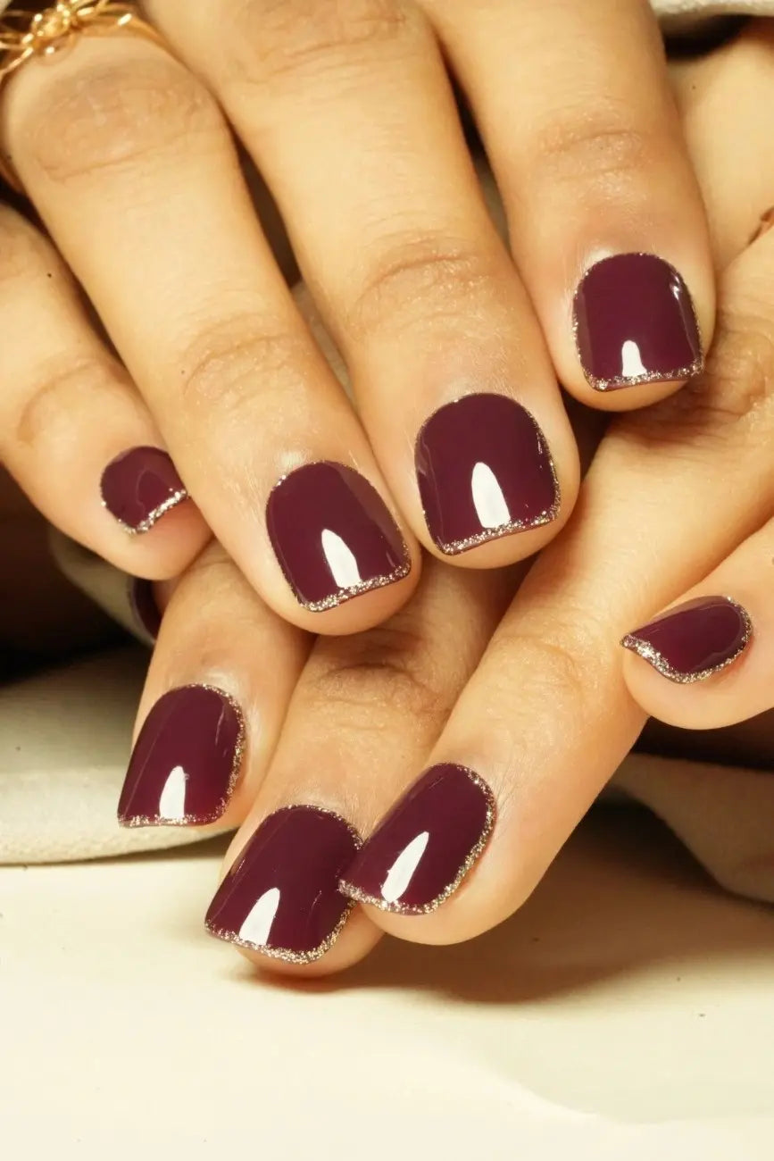 Close-up of Berry Elegance premium handmade press-on nails