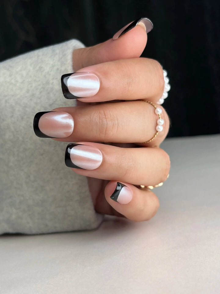 black french tip manicure fake nude base colour with silver white chrome french fake press on. nails