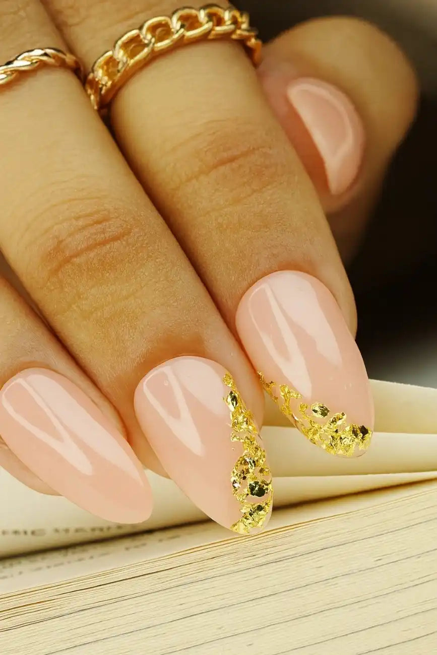 Close-up of Blush Gold premium handmade press-on nails