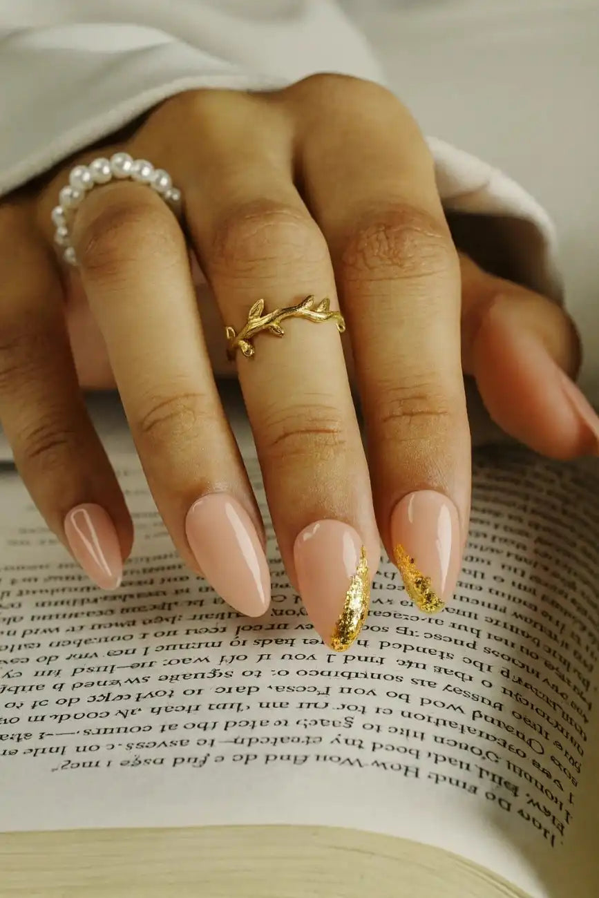 Blush pink press-on nails with elegant gold details