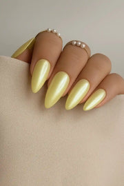 Butter Glow handmade reusable soft gel press-on nails with a soft buttery yellow finish by Naakhun