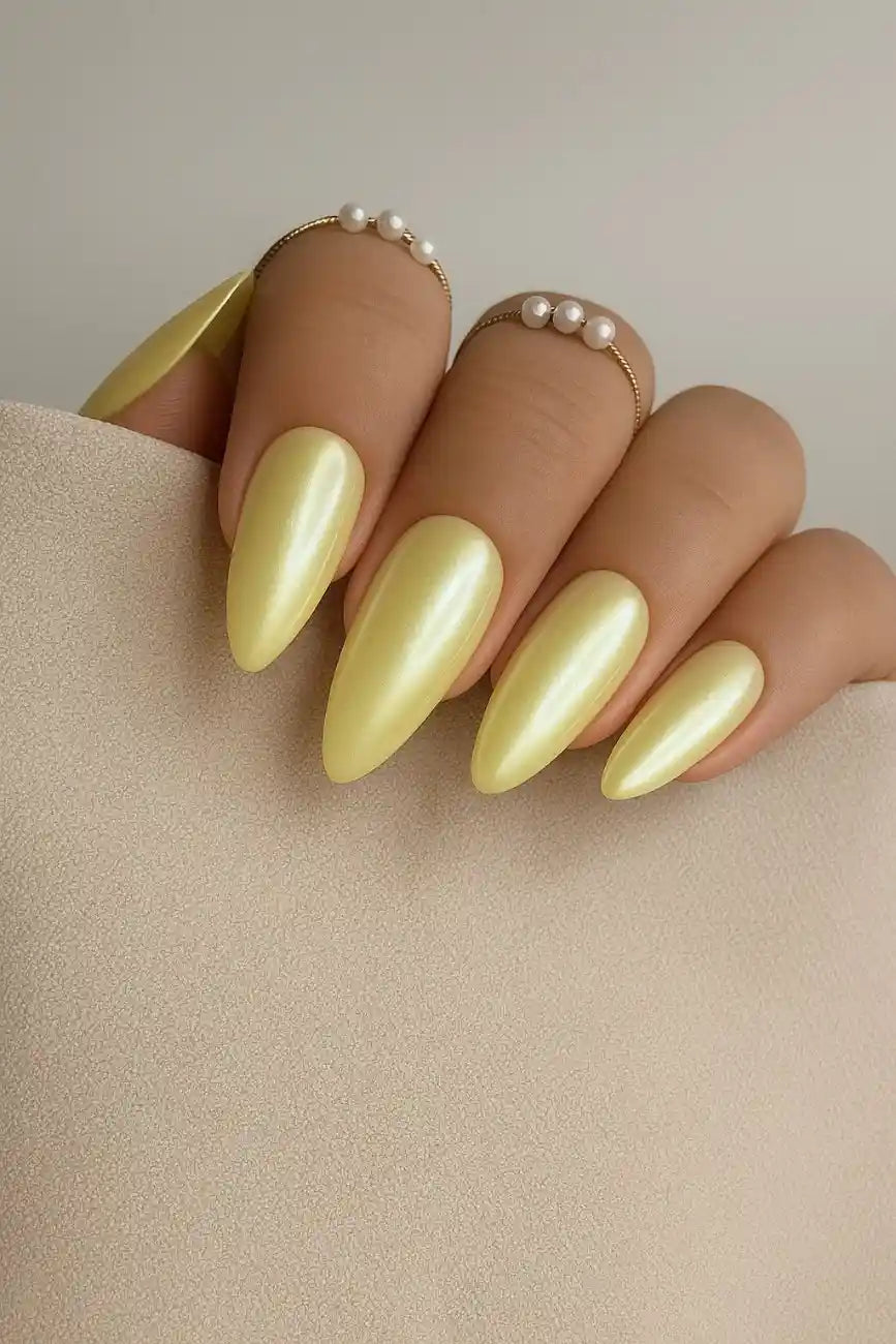 Butter Glow handmade reusable soft gel press-on nails with a soft buttery yellow finish by Naakhun