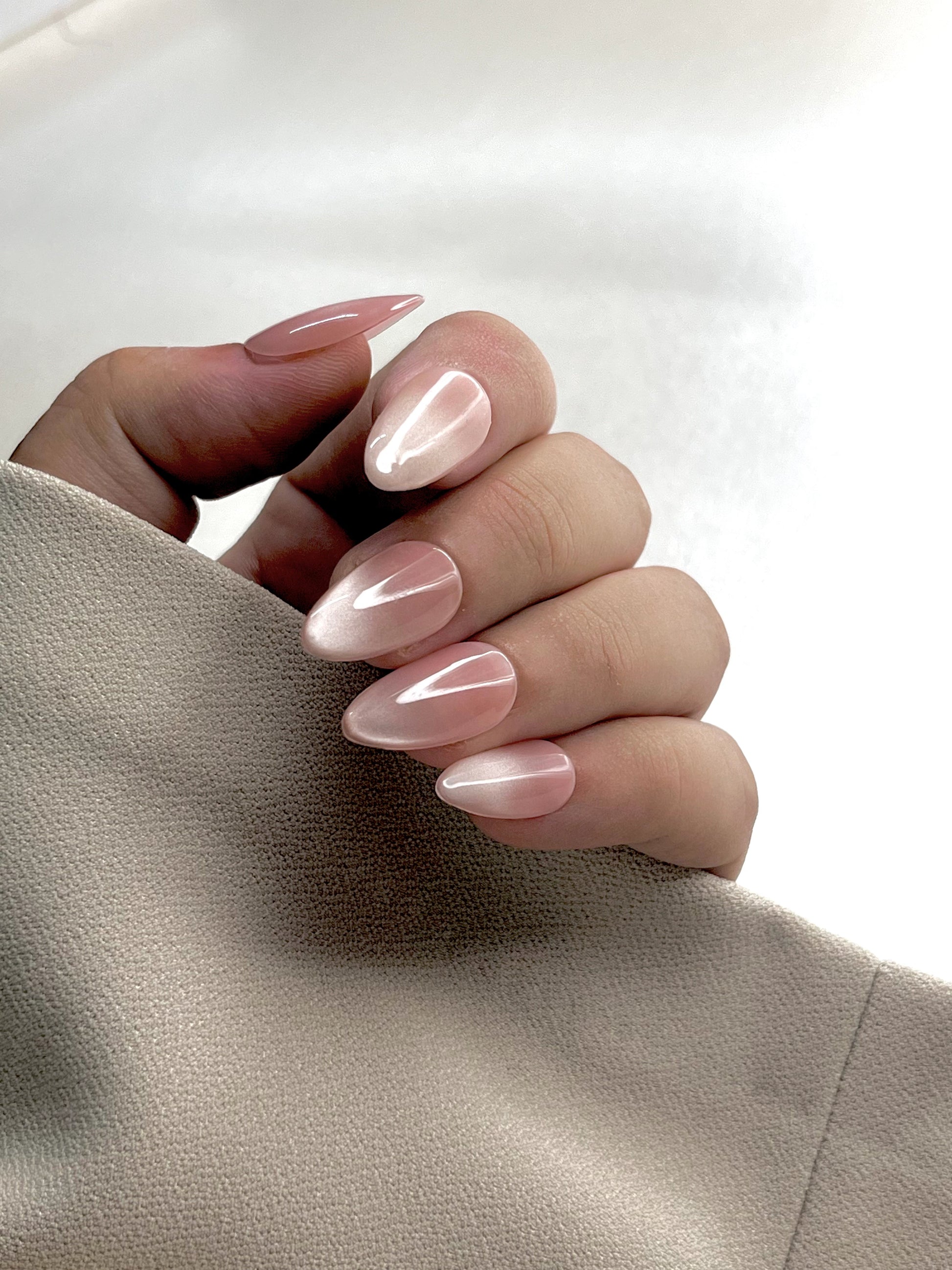 Evaluate your nails game with our handmade Cat Eye Soft Gel Press On Nails. These rose pink cat eye nails are made of 100% soft gel material. These nails provides you salon like finishing at home without wasting hours in just 5 minutes. These nails are easy to apply &amp; remove and also 5x reusable.