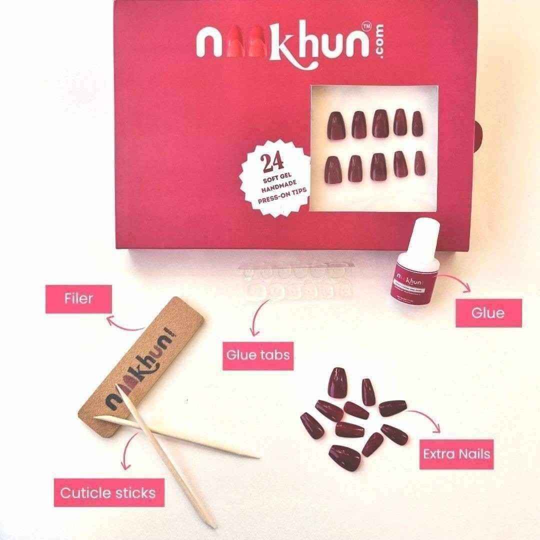Cherry Bomb press-on nail kit with glue, glue tabs and nail tools