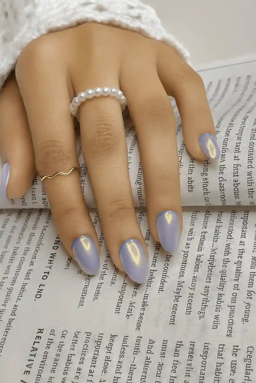Chroma Glow handmade reusable soft gel press-on nails with a radiant chrome finish by Naakhun