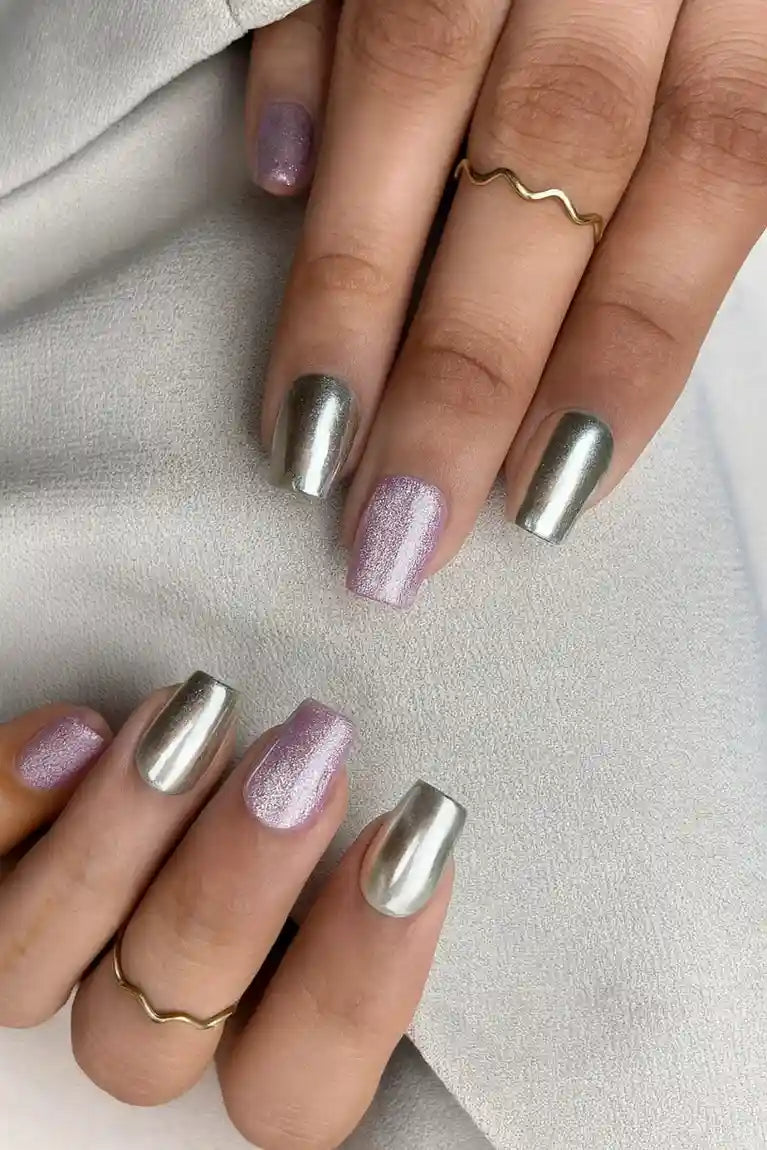 Chrome-finish press-on nails with elegant floral details