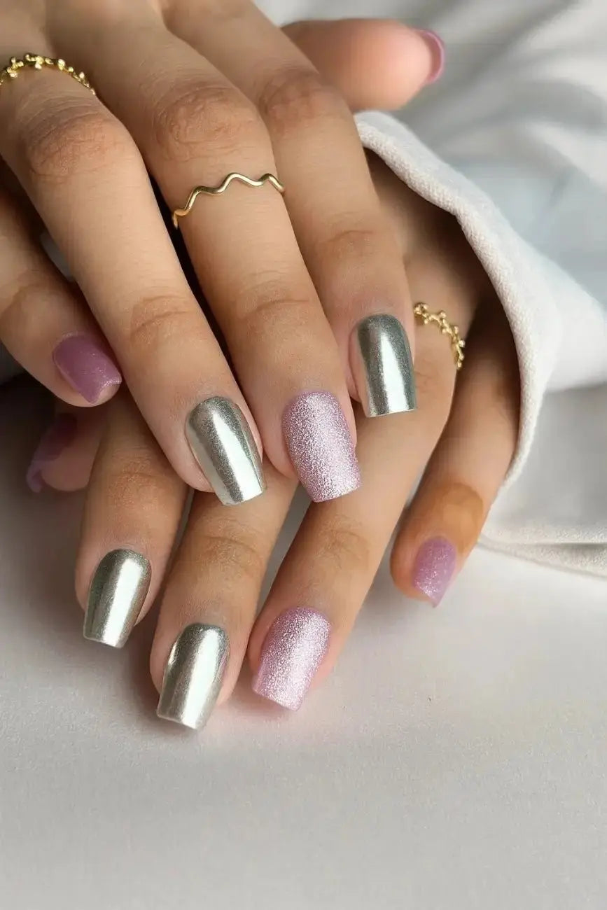 Chrome Bloom handmade reusable soft gel press-on nails with metallic chrome and floral design by Naakhun