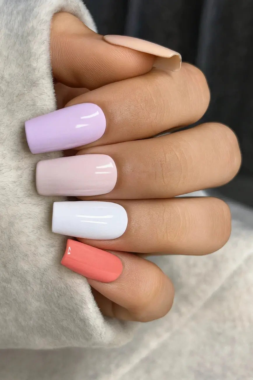 Close-up of Colour Splash nails highlighting vibrant multicolor details