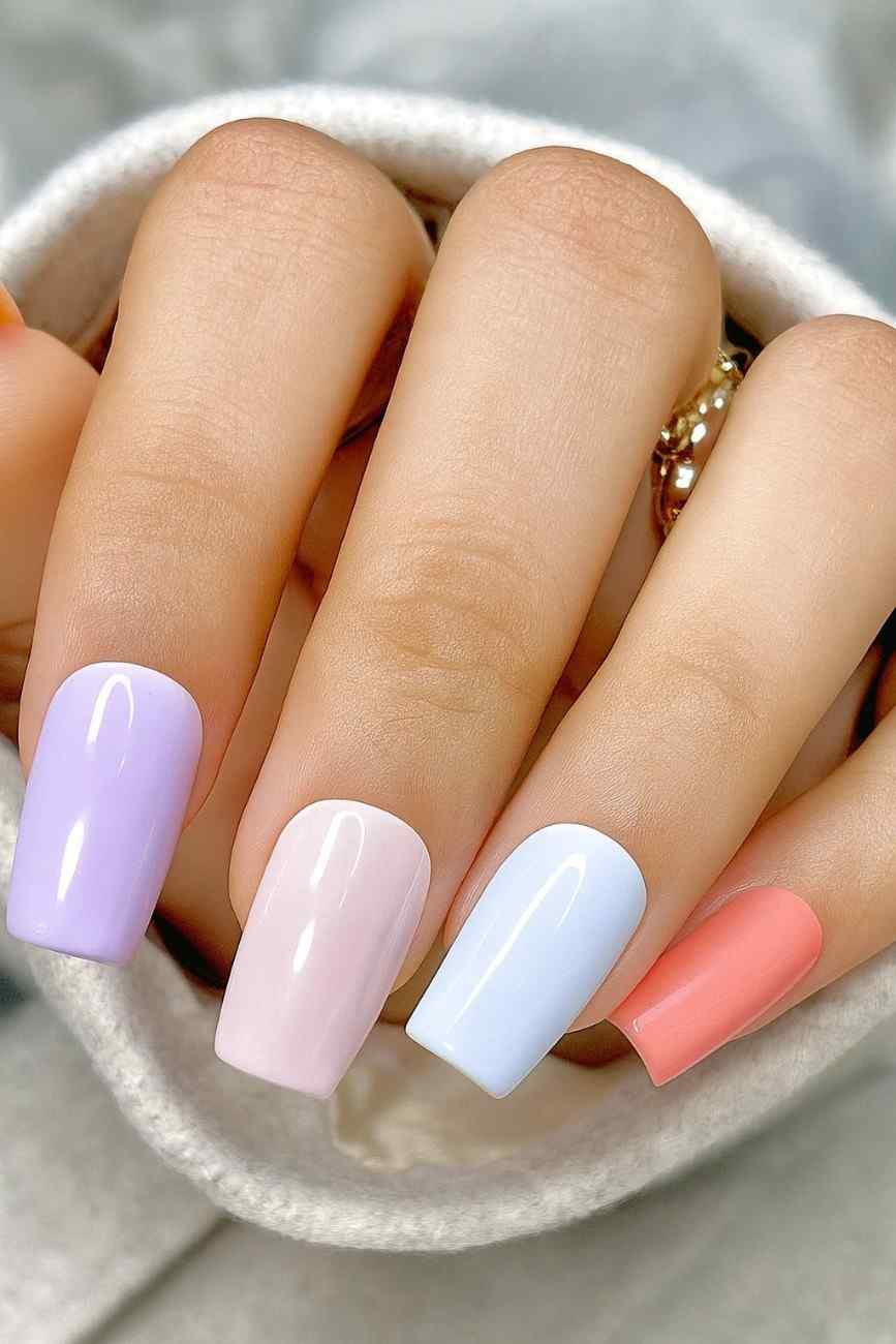 Colorful press-on nails styled for vacations, festivals, and everyday fashion
