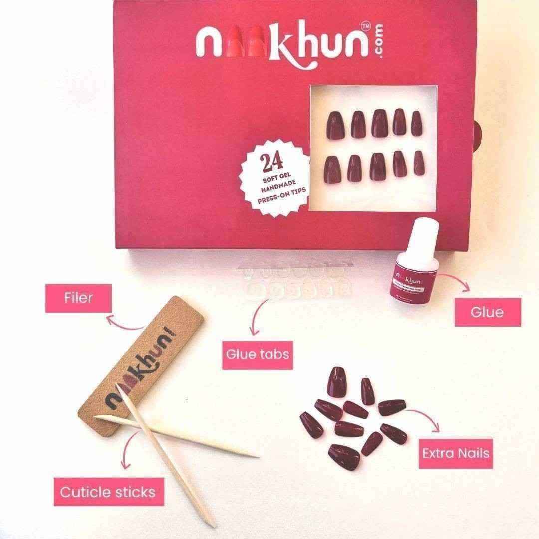 Crimson Classic press-on nail kit with glue, glue tabs and nail tools