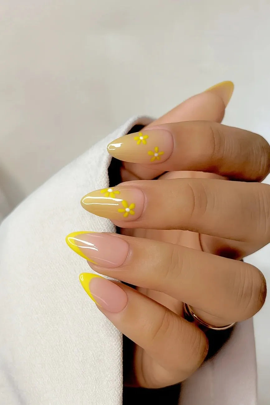Close-up of Daisy Drip premium handmade press-on nails