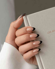 Dark Muse handmade reusable soft gel press-on nails with sophisticated dark finish by Naakhun