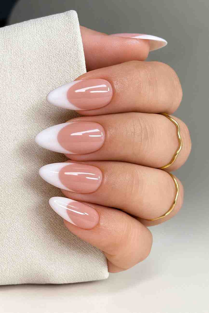 French Bliss handmade reusable soft gel press-on nails with a classic French tip design by Naakhun