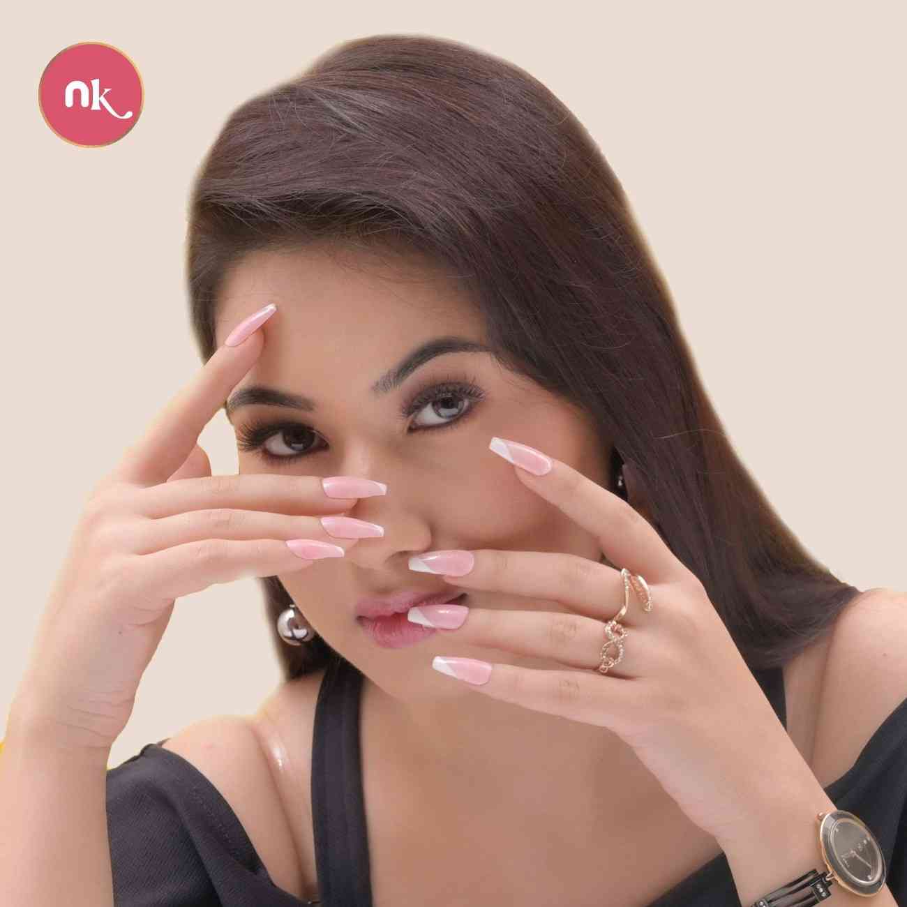 French Kiss reusable press-on nails worn on hand for a chic and timeless look