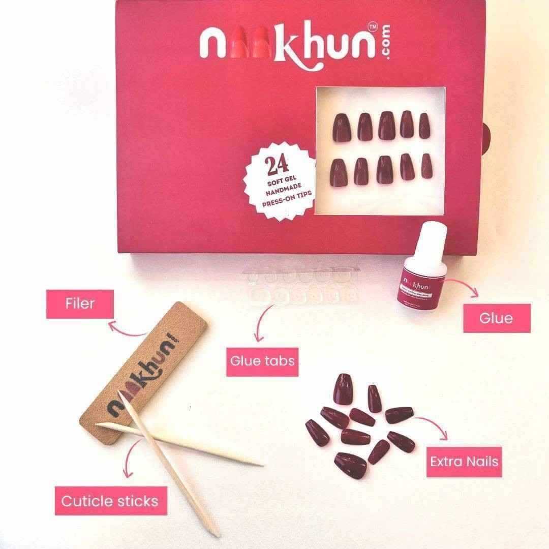Glazed Cat Eye nail kit including reusable press-on nails, glue, glue tabs, nail file, cuticle stick, and alcohol prep pad.