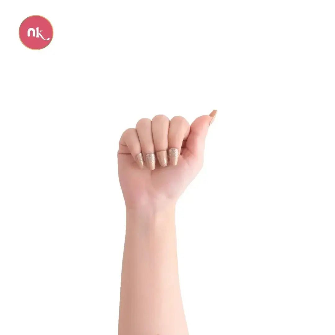Golden Fire reusable press-on nails worn on hand for a bold glamorous look