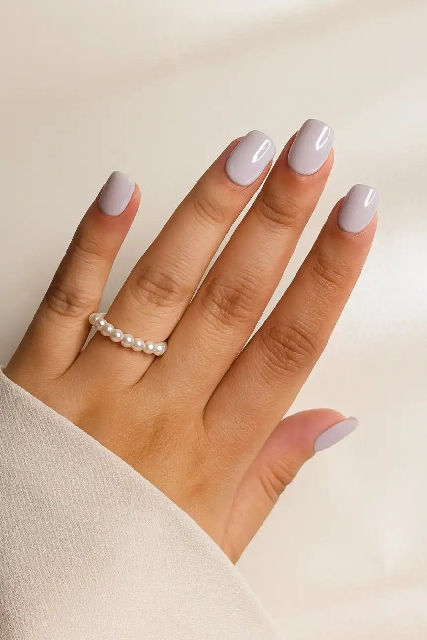 Lavender Cloud reusable press-on nails worn on hand