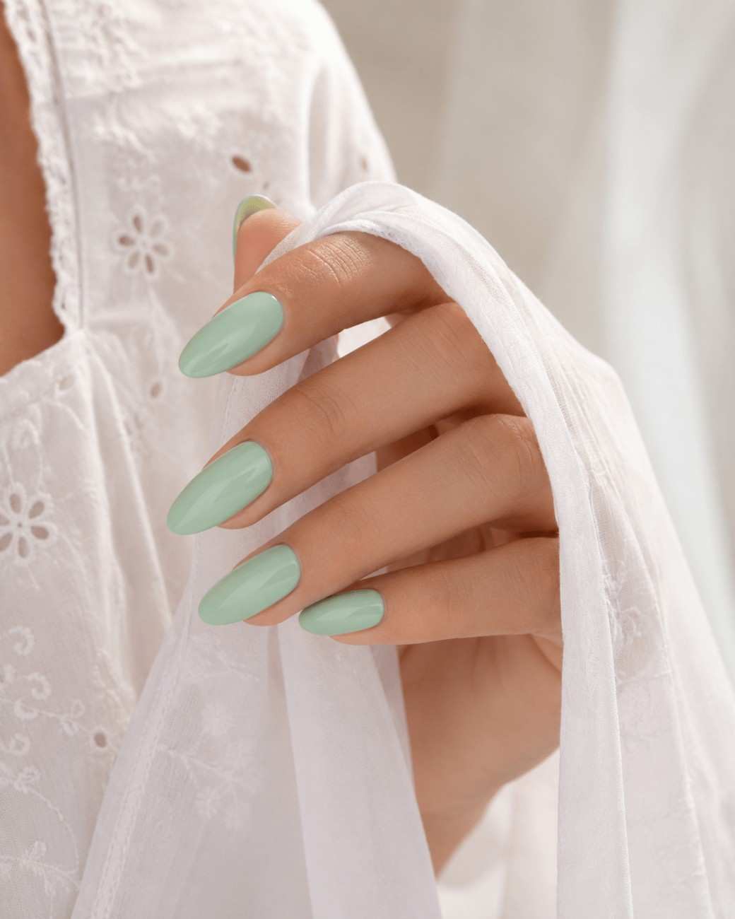 Mint green press-on nails with glossy salon-quality finish