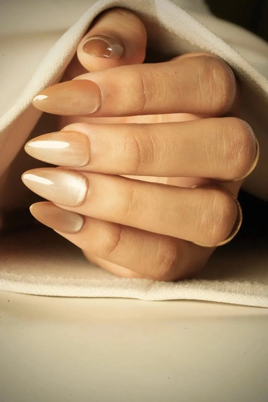 Mocha Glaze reusable press-on nails worn on hand