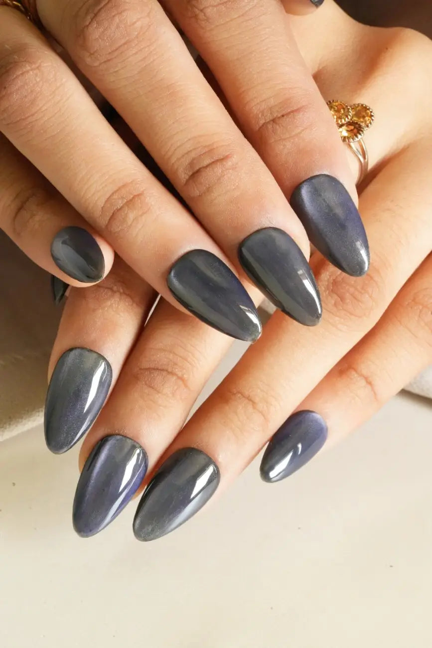 Nightfall Glow reusable press-on nails worn on hand