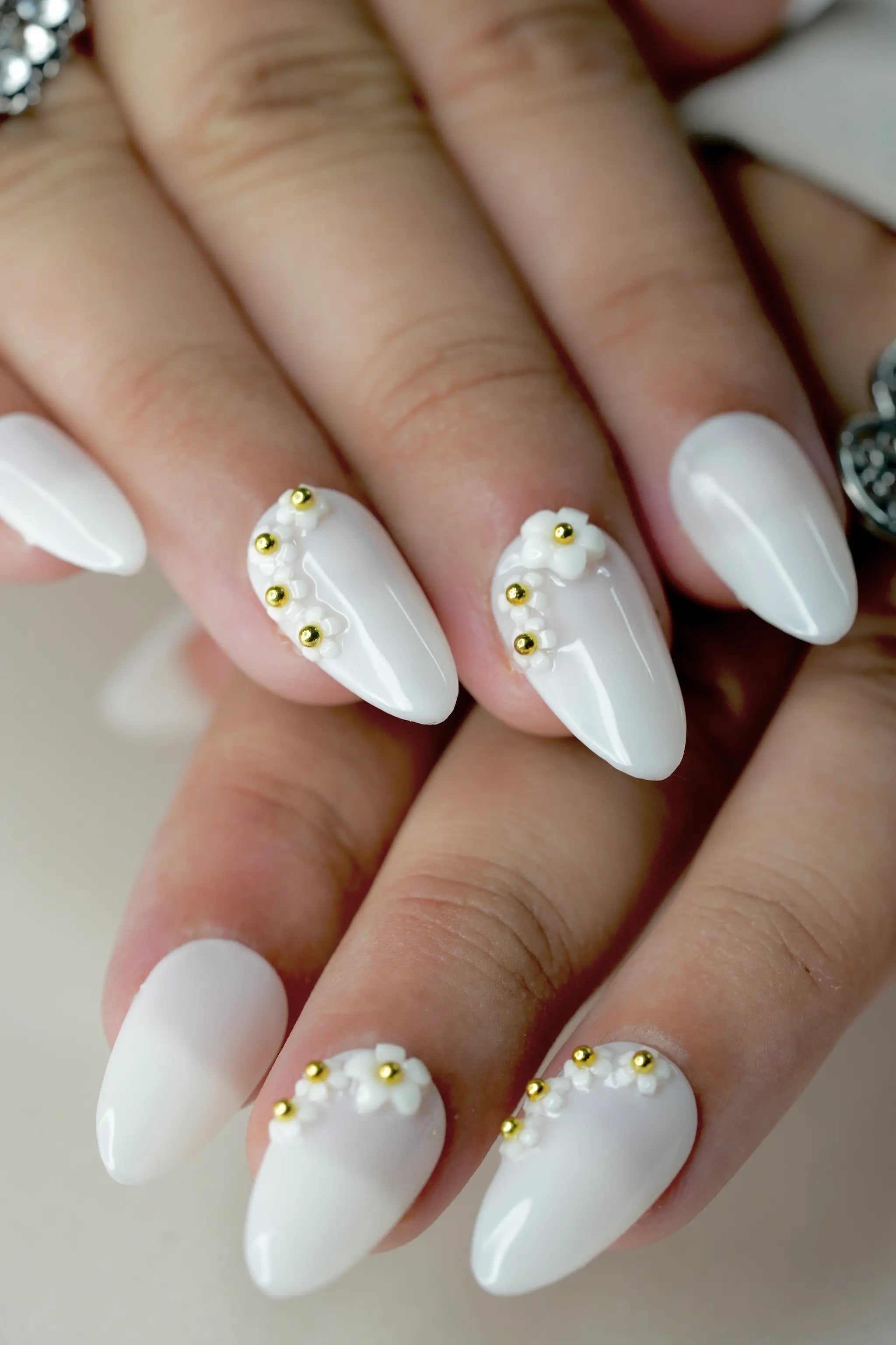 Close-up of Pearl Glow premium handmade press-on nails