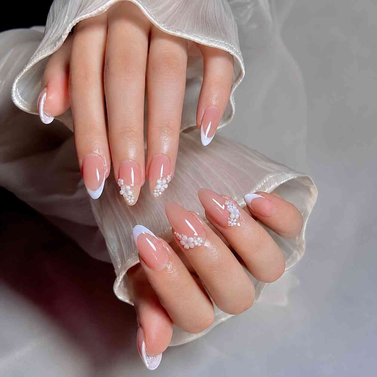 Front view of Pearl Petals press-on nails featuring delicate pearl-inspired accents.