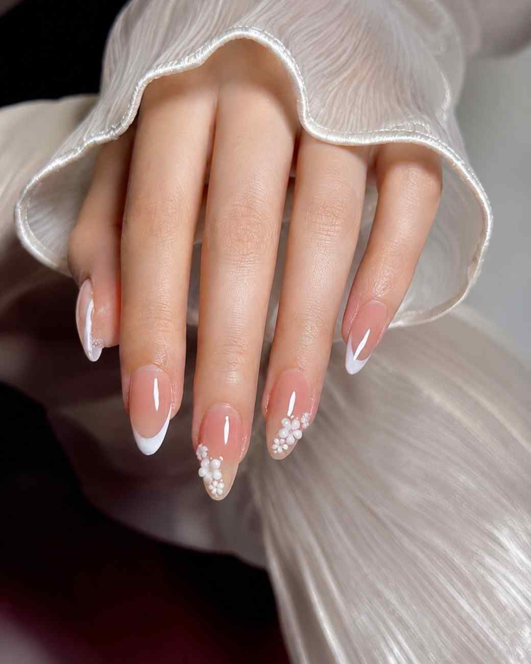 Pearl Petals handmade soft gel press-on nails with elegant pearl and floral details by Naakhun.
