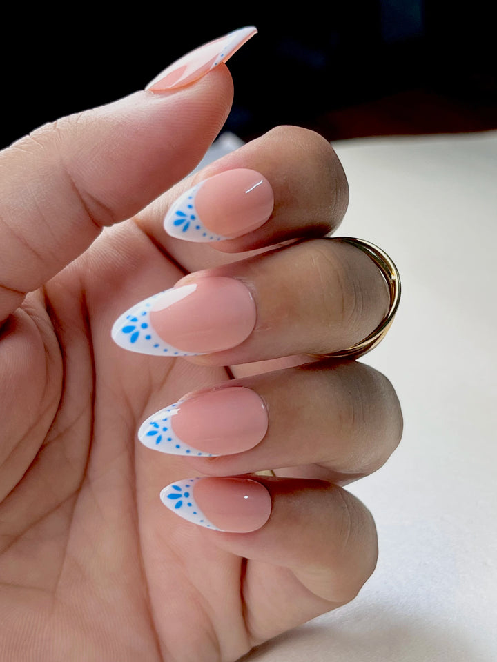 Pink and white French press-on nails made from soft gel