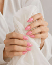 Pretty In Pink handmade reusable soft gel press-on nails with glossy pink finish by Naakhun