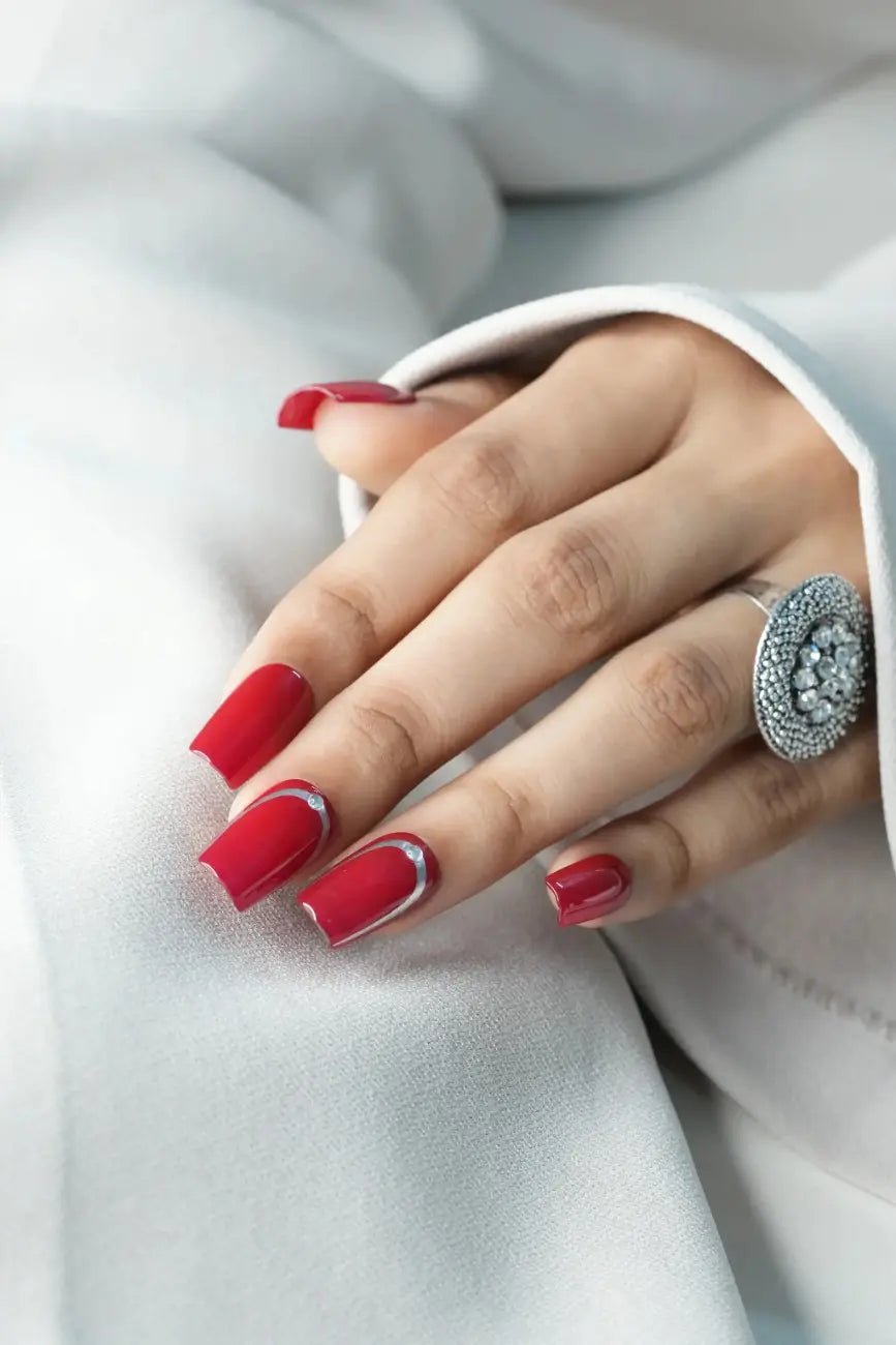 Close-up of Red Affair premium handmade press-on nails