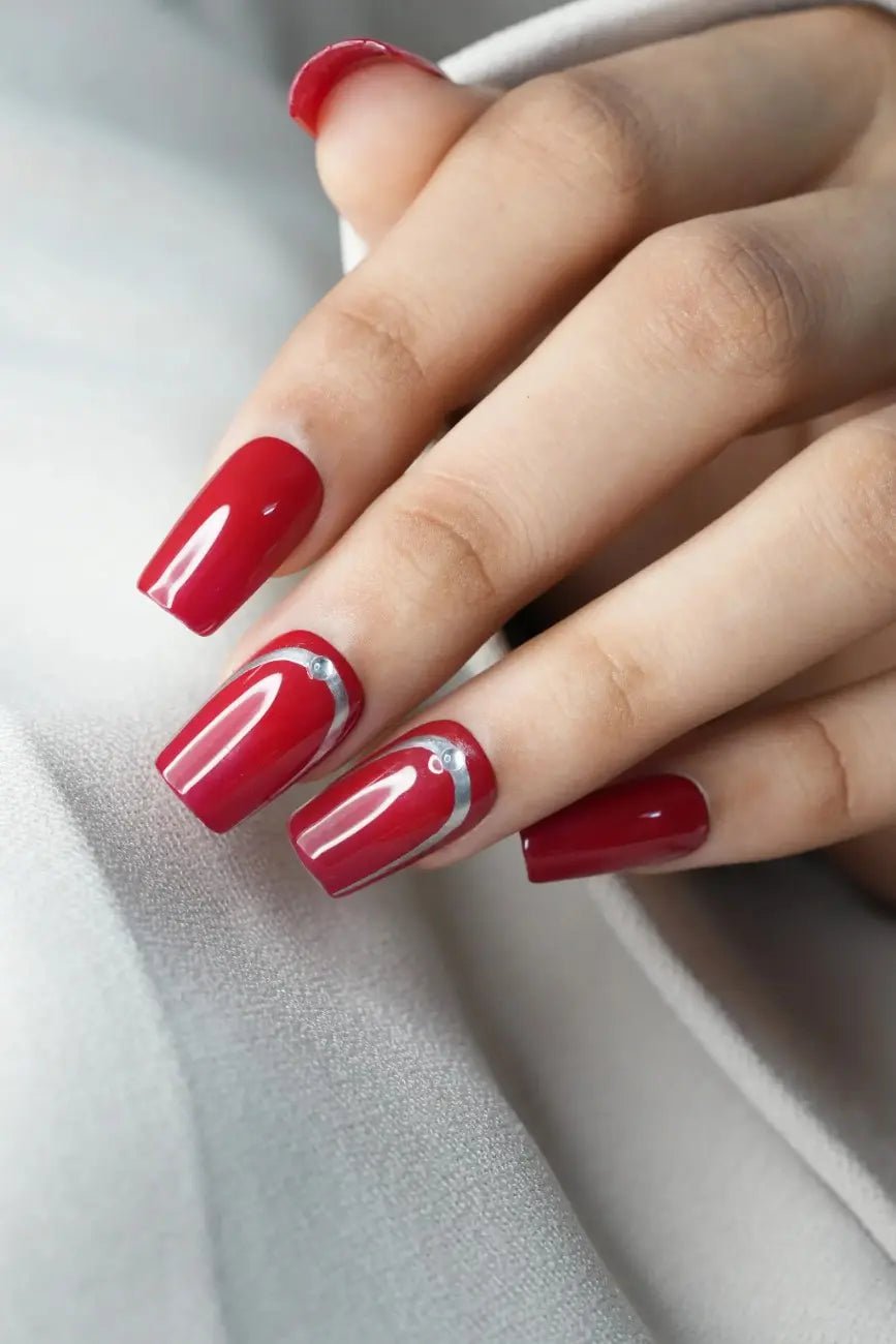 Red Affair handmade reusable soft gel press-on nails with a luxurious deep red finish by Naakhun