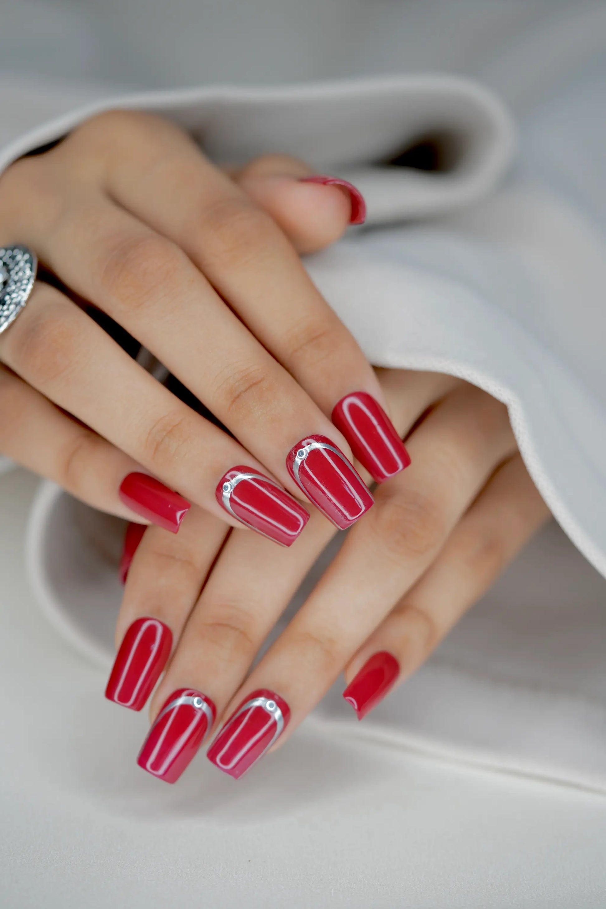 Elegant red press-on nails with salon-quality finish