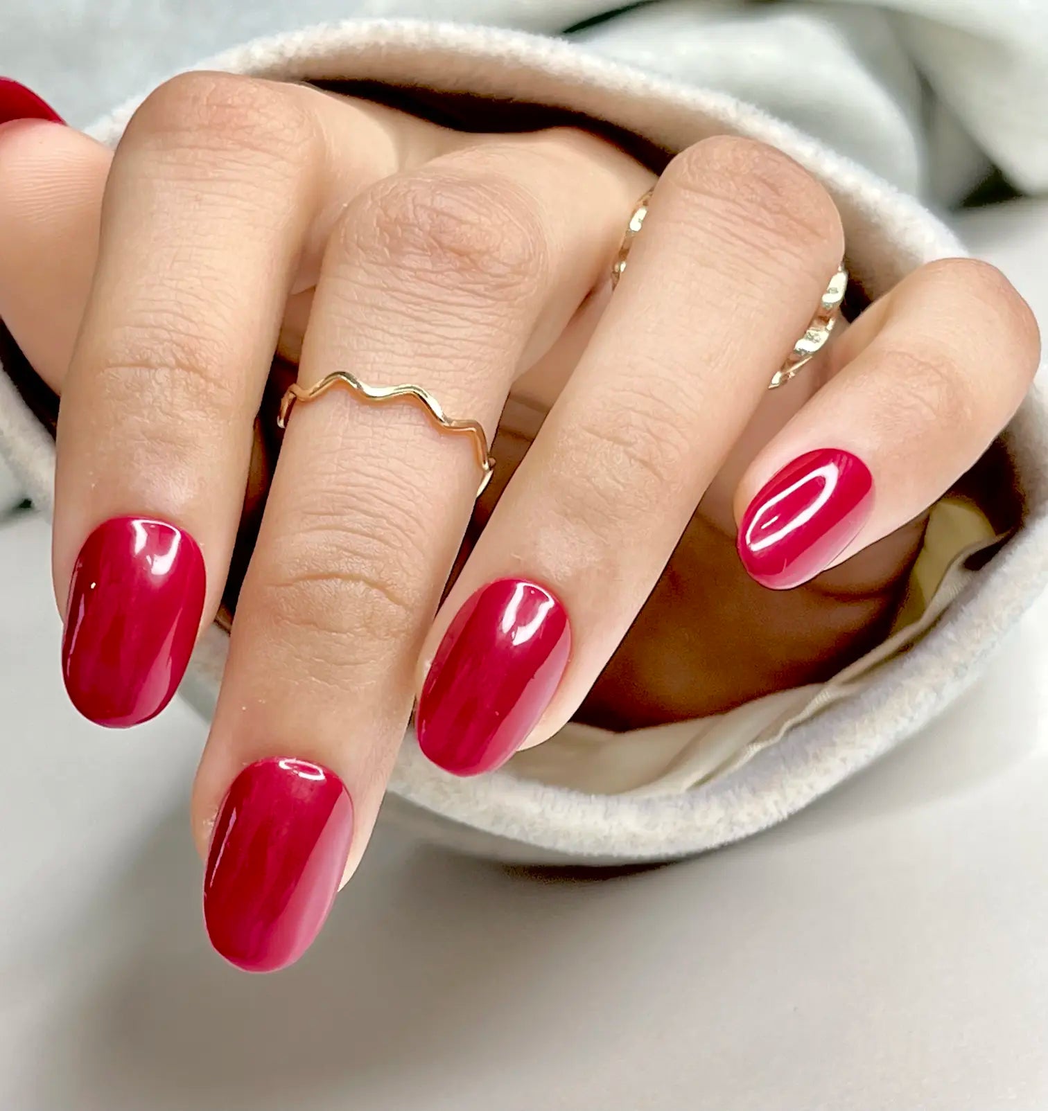 Front view of Red Rush press-on nails featuring a vibrant red salon-quality design