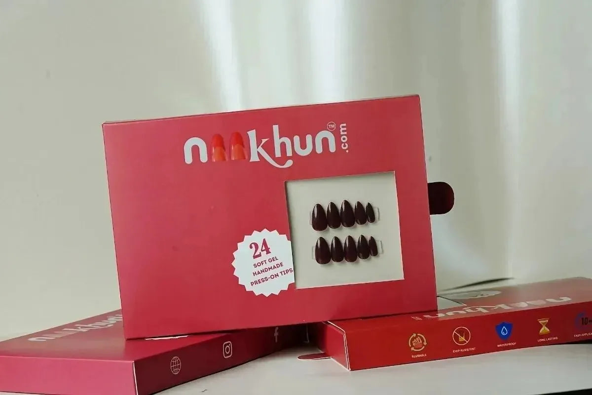Naakhun Rose Cat Eye press-on nail packaging with complete nail application kit.