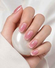 Rose Cat Eye handmade soft gel press-on nails with a shimmering rose pink cat-eye effect by Naakhun.