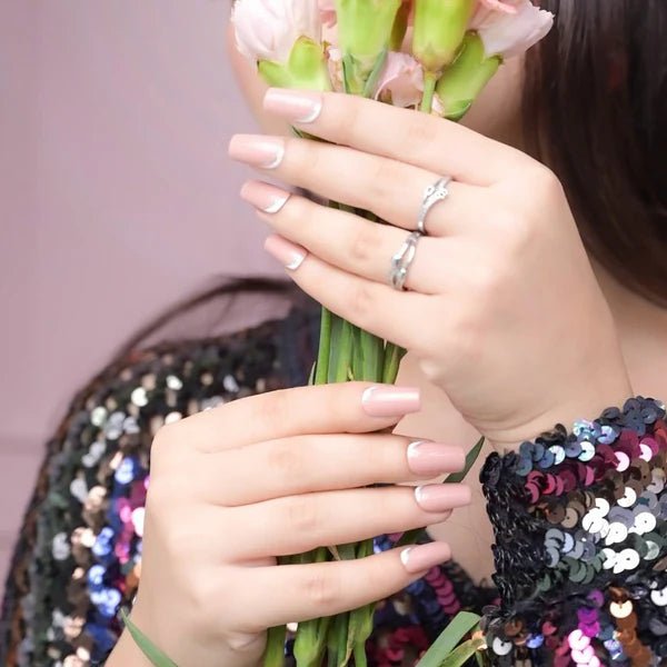 nude rose brown soft gel stick on fake nails with glitter french on them