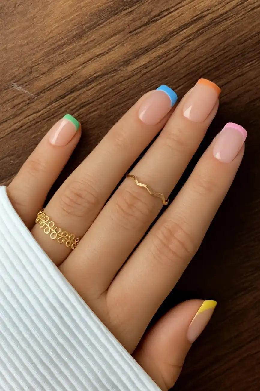 Close-up of Sunset Slice nails highlighting warm gradient orange and glossy finish