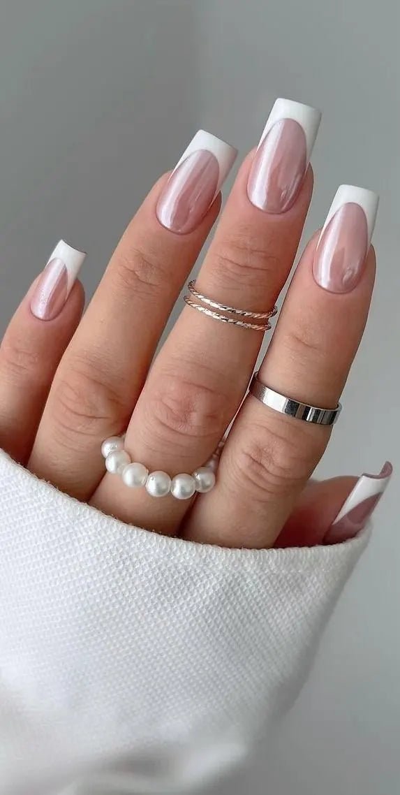 Close-up of White Chroma nails highlighting the reflective chrome finish