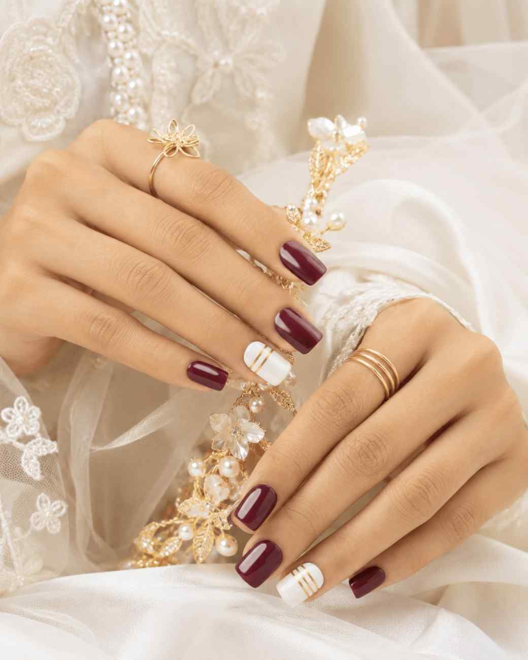Wine Pop handmade reusable soft gel press-on nails with rich wine red finish by Naakhun