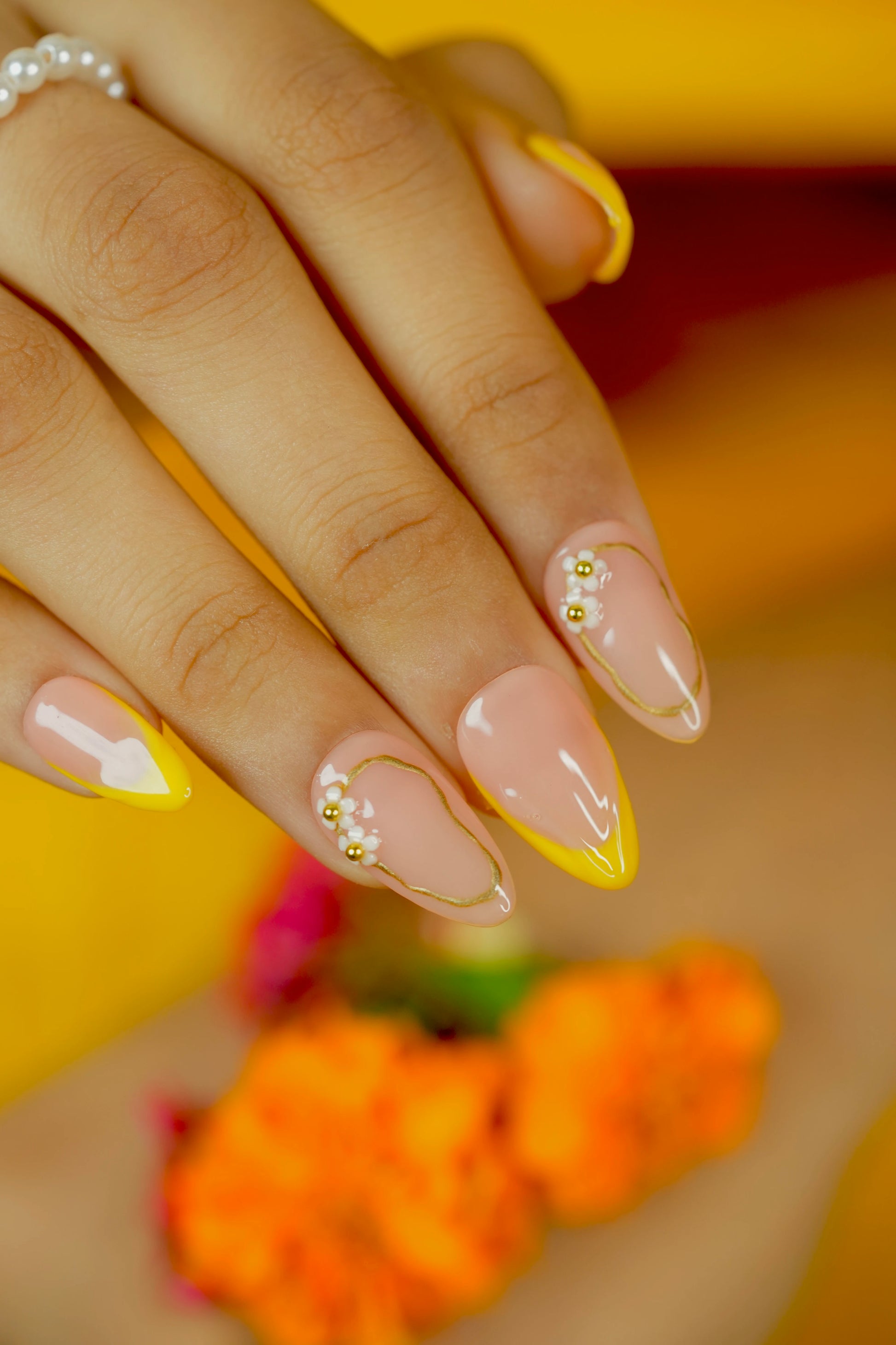 Glossy yellow wedding nails for Haldi and Mehndi look